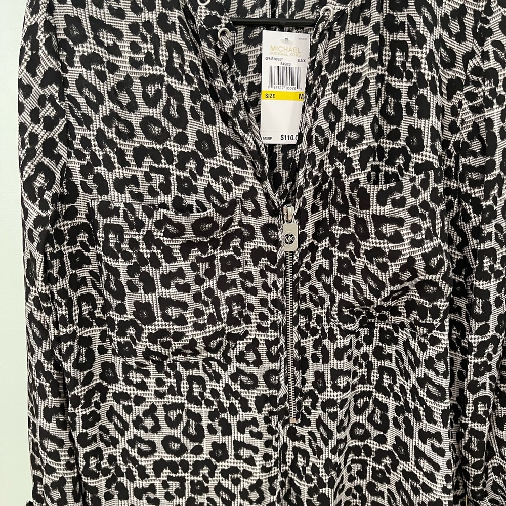 Michael Kor’s top. Brand new.It is beautiful. It is slightly longer in the back